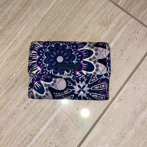 A cute purple with flowers wallet